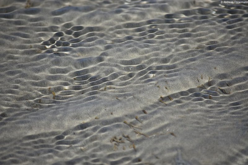 Sand und Wasser